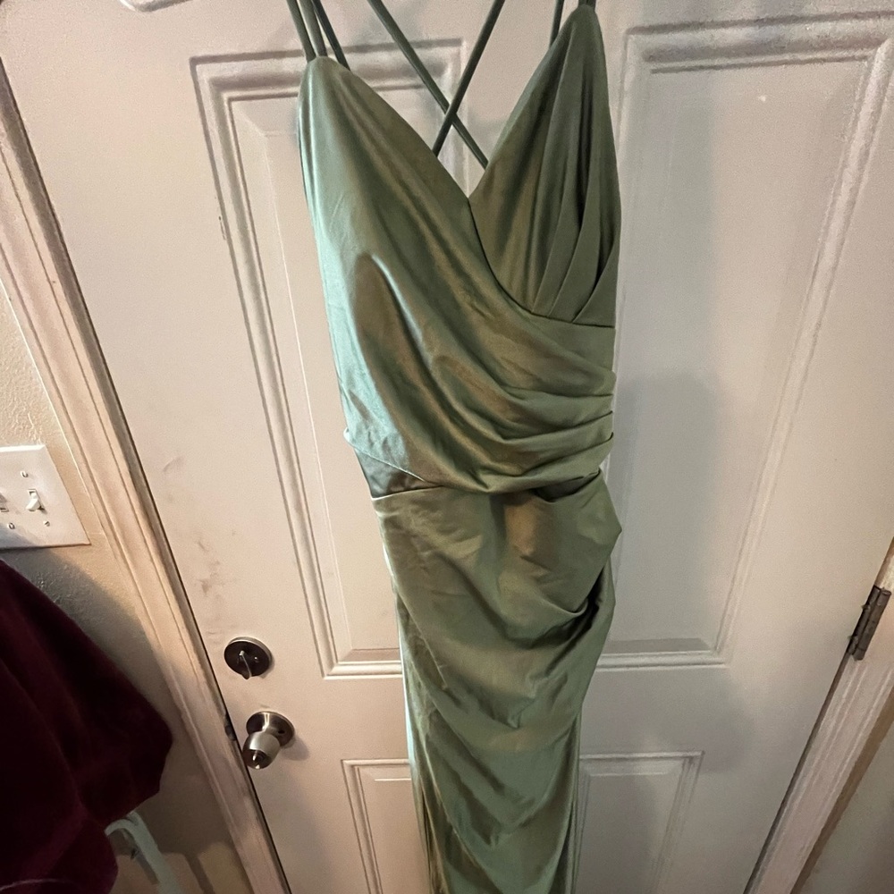 A light mint green dress perfect for prom or a wedding